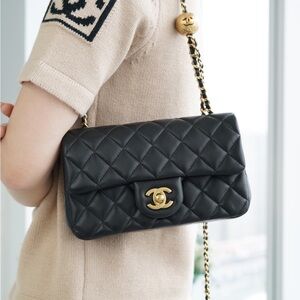 CHANEL Black Quilted Shoulder Bag with Gold Accents